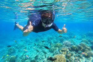 Snorkeling in clear water around Gili Air
